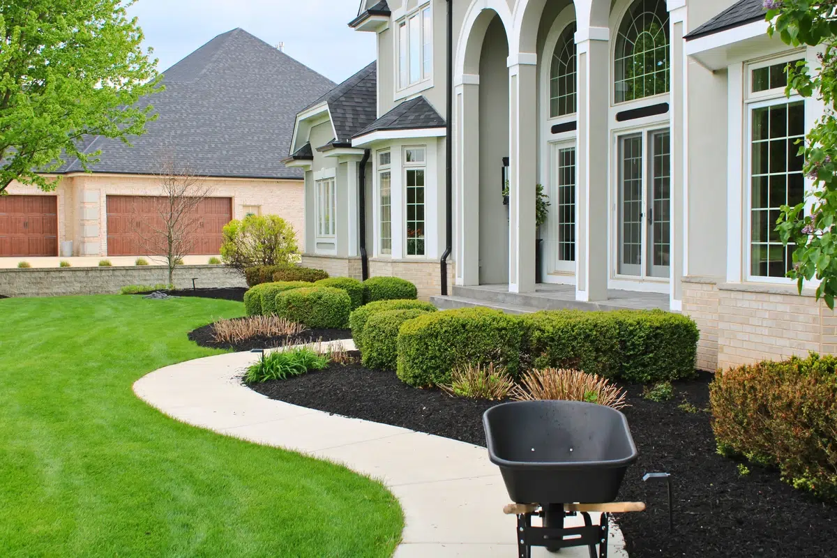 Finished mulch installation at a Waukesha County home by Best Bark Mulch
