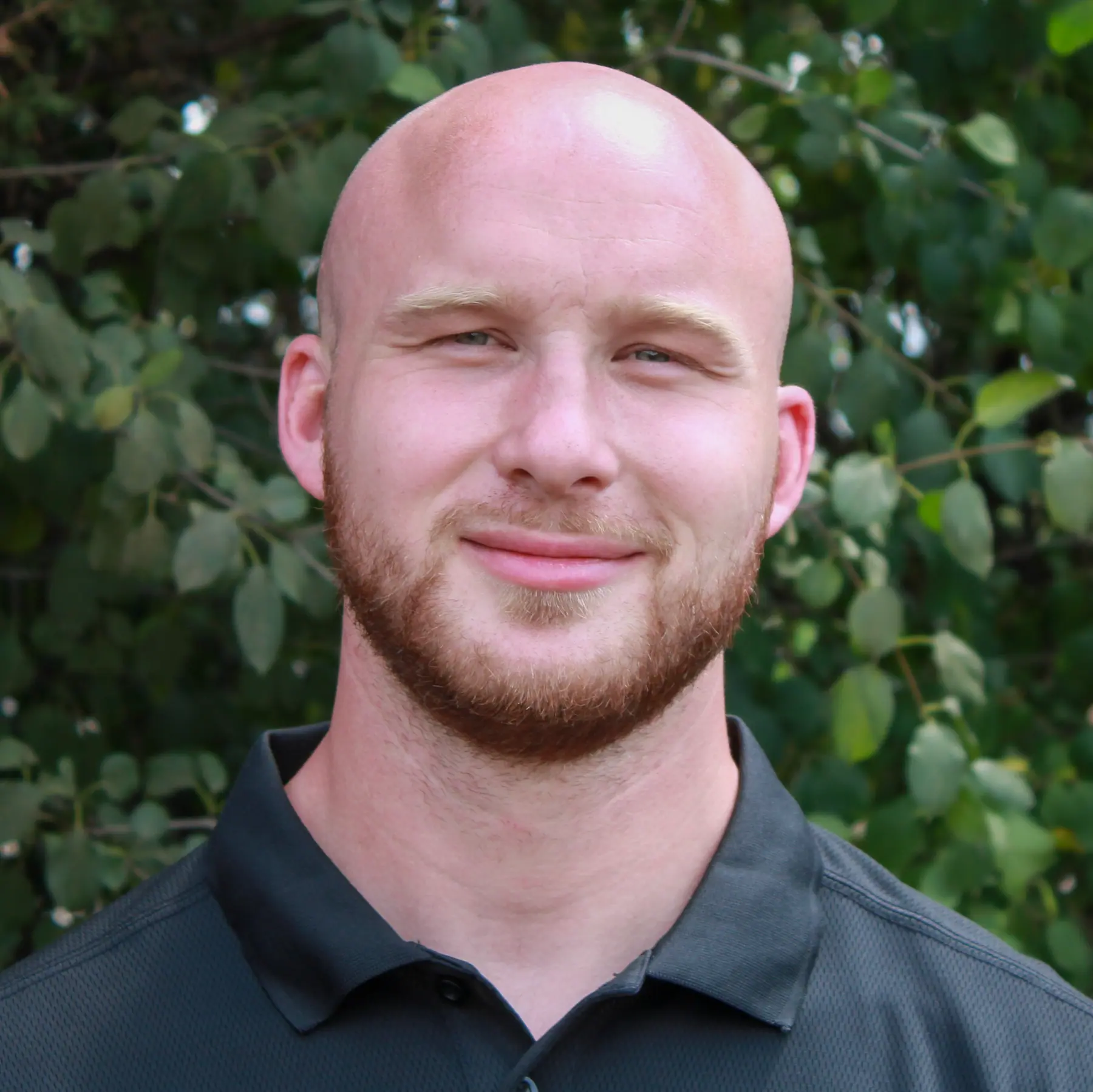 a headshot image of tyler mainka, the co-founder of best bark mulch and a mulch expert and author of the blog posts on bestbarkmulch.com